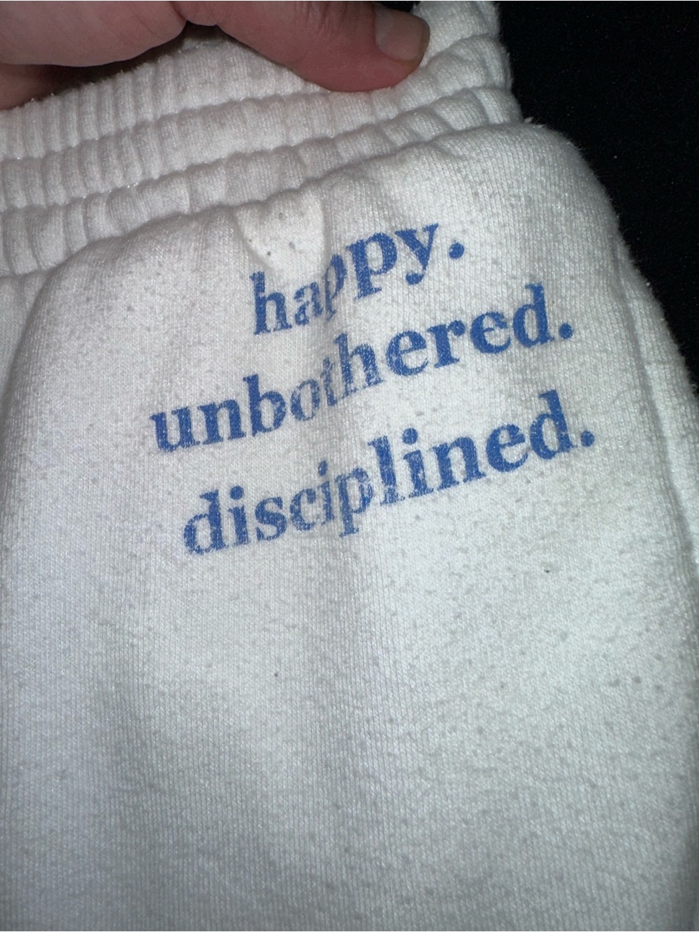 White Sweat shorts with Blue Text "happy. unbothered. disciplined."